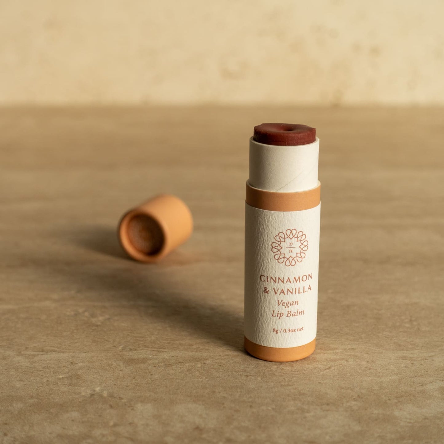 nz made lip balm cinnamon and vanilla type slightly tinted in compostable tube