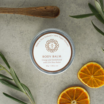 Body balm made in NZ with 25% organic shea butter fragranced with orange and sandalwood