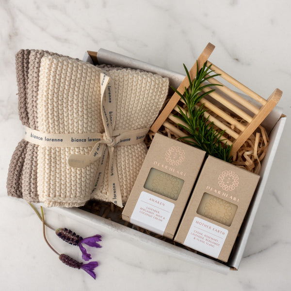 gift box with two soaps washcloth trio and bamboo soap rack essential oil fragrances luxury brand
