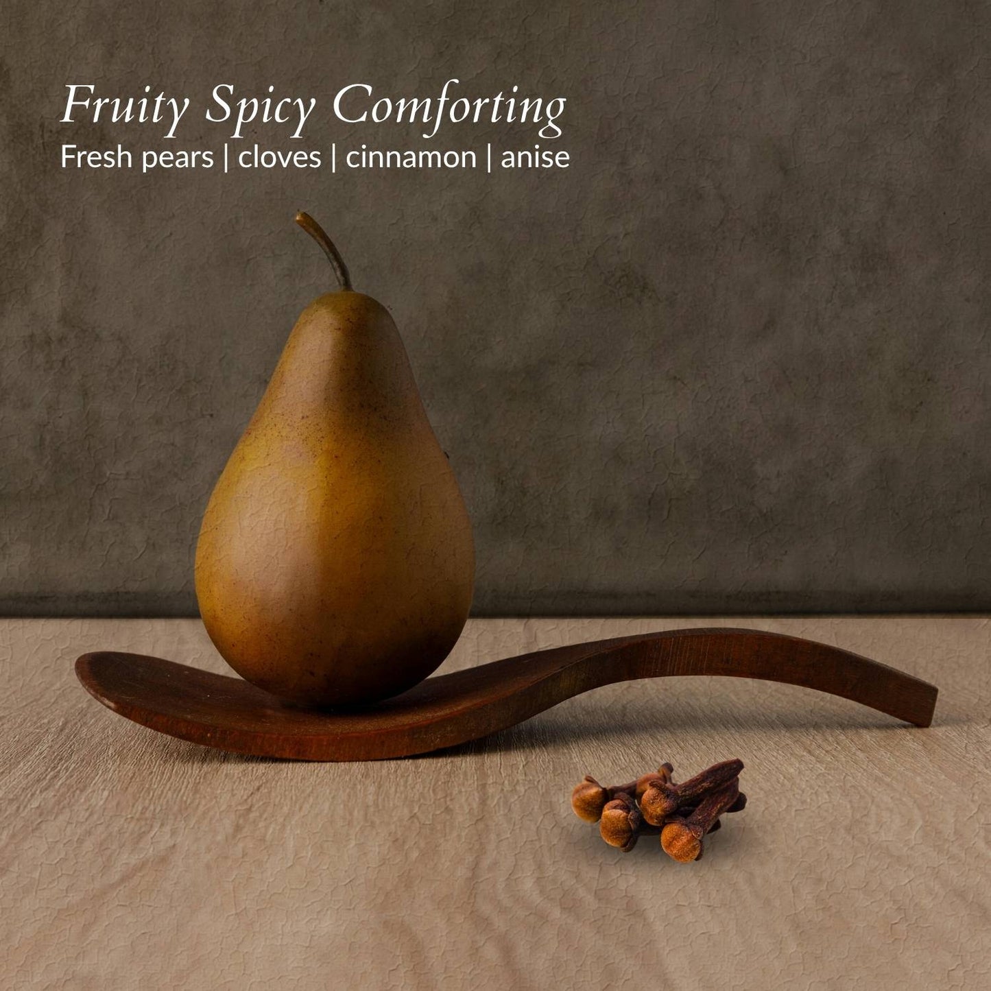 close up of a pear fruity spicy comforting fresh pears cloves cinnamon anise soy candle by dear heart
