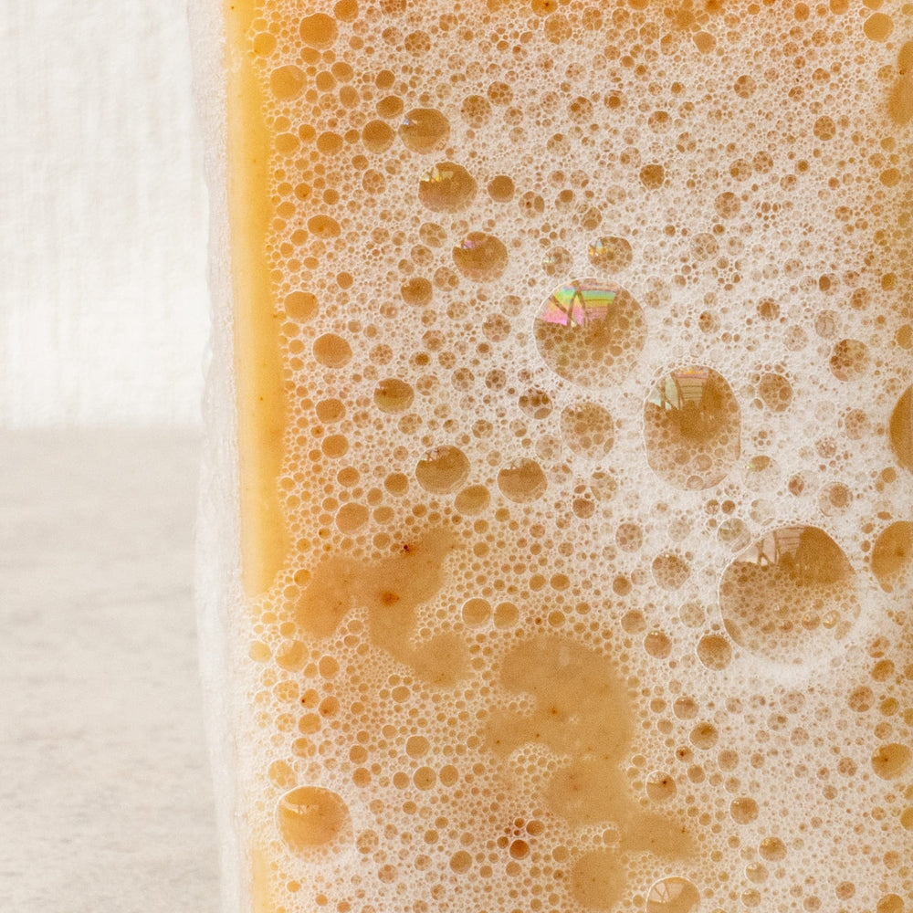
                  
                    close up of dear hearts chai latte soap with lather
                  
                