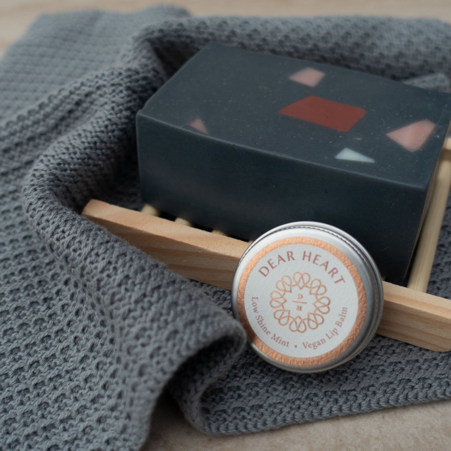 Lip balm with 'Dear Heart' branding handcrafted soap with lemongrass patchouli ylang ylang and lavender comes with a wooden soap rack