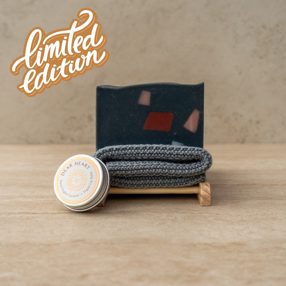 soap gift box with charcoal soap organic wash cloth wooden soap rack and coconut lip balm in a tin