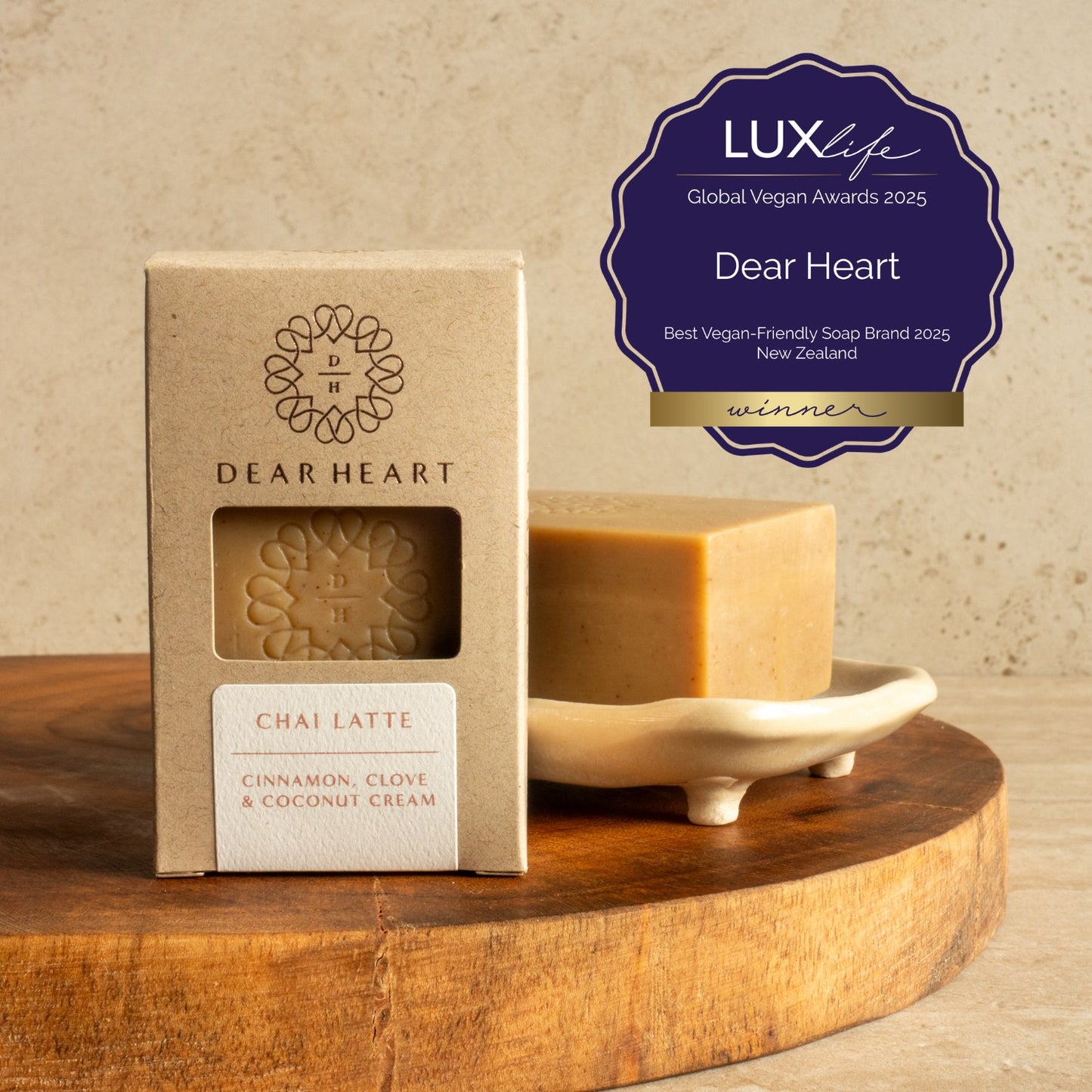 chai latte soap boxed shown in the box and on a soap dish cinnamon clove essential oils coconut cream