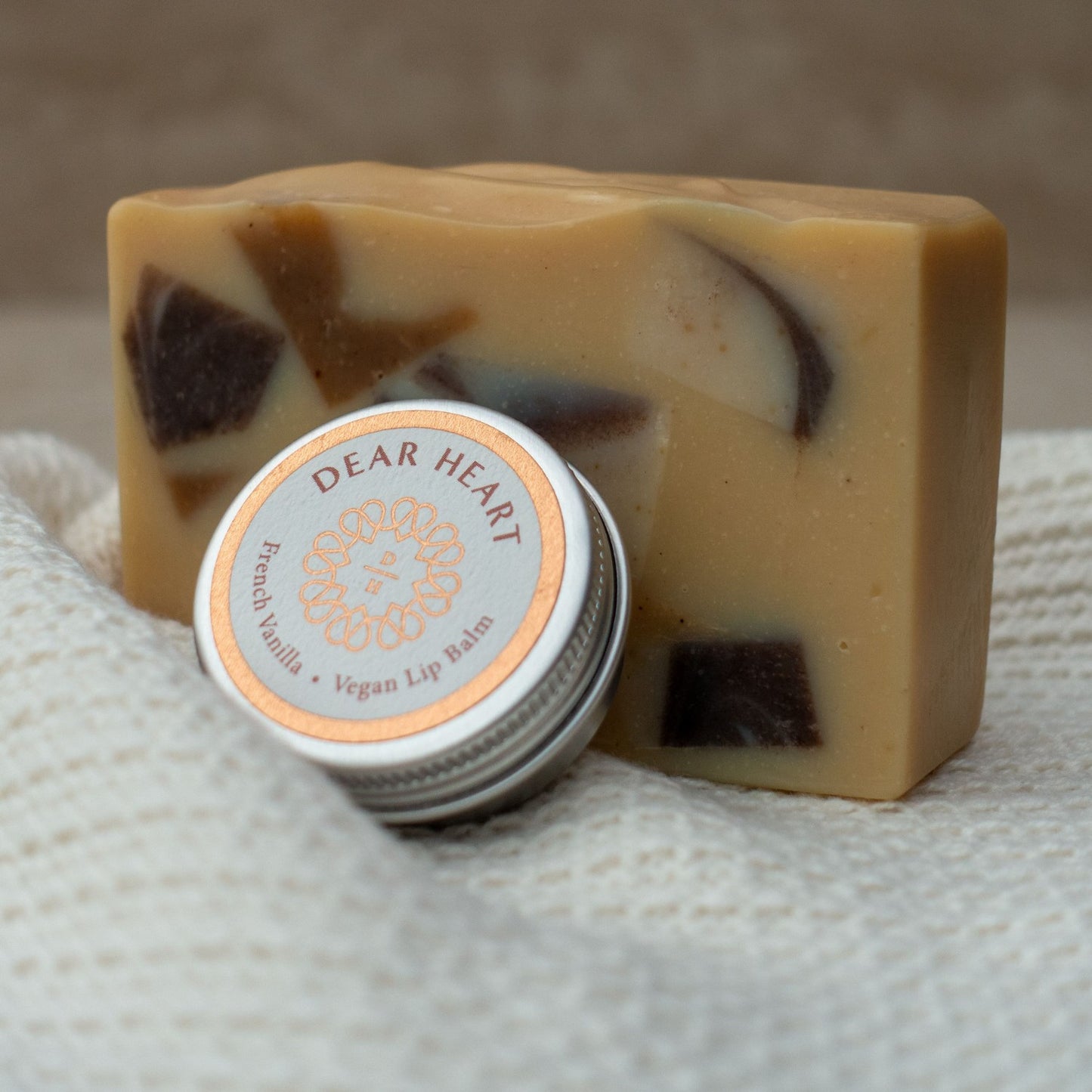 vegan gift boxes made in nz with handcrafted large size soap bar with cinnamon and clove oils, wooden soap rack, vanilla lip balm and organic cotton wash cloth