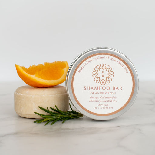 oily hair shampoo nz with orange cedarwood rosemary essential oils in an eco-friendly tin